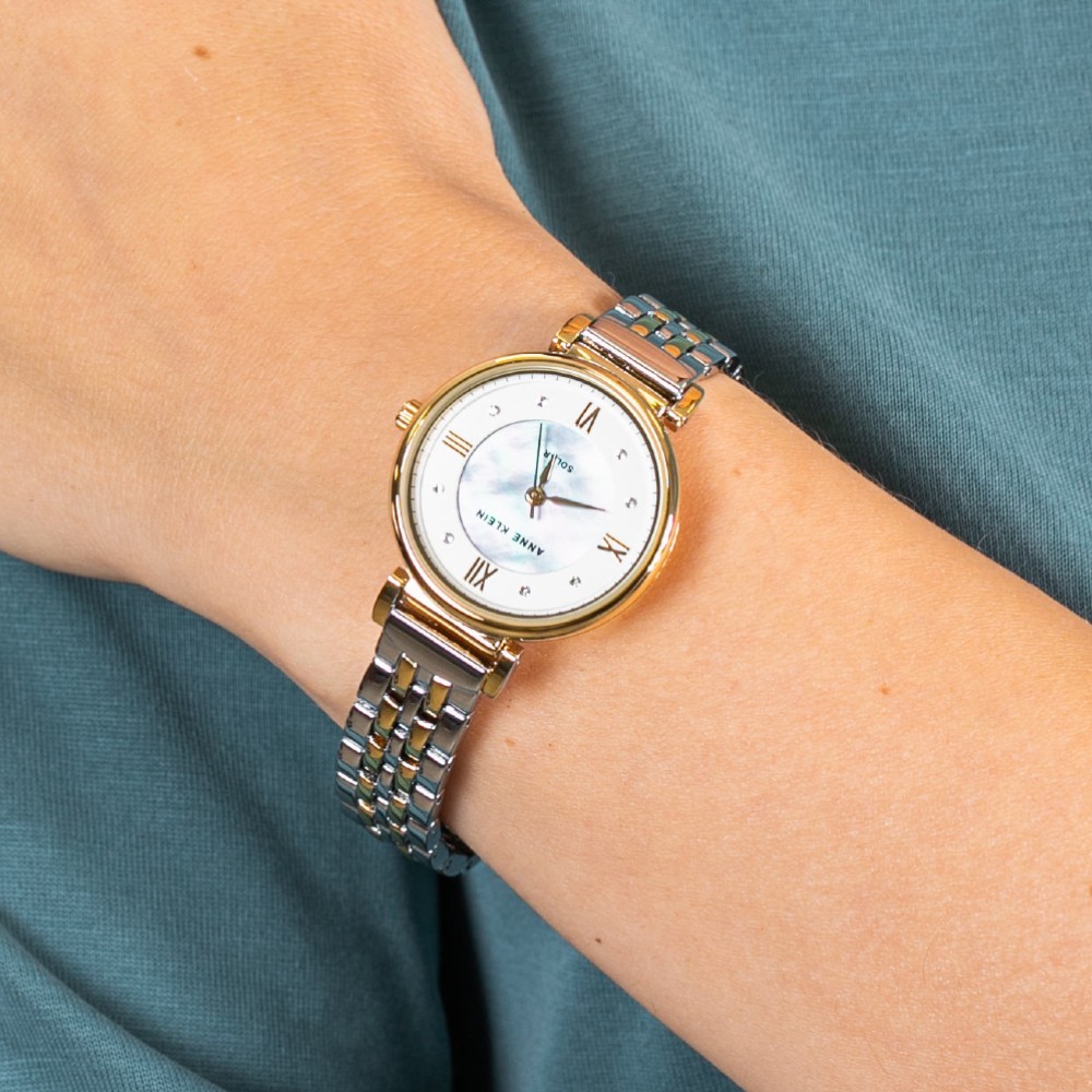 Anne Klein AK/3631MPTT Solar Powered Swarovski Crystal นาฬิกาข้อมือผู้หญิงพลังงานแสงอาทิตย์ สีเงิน